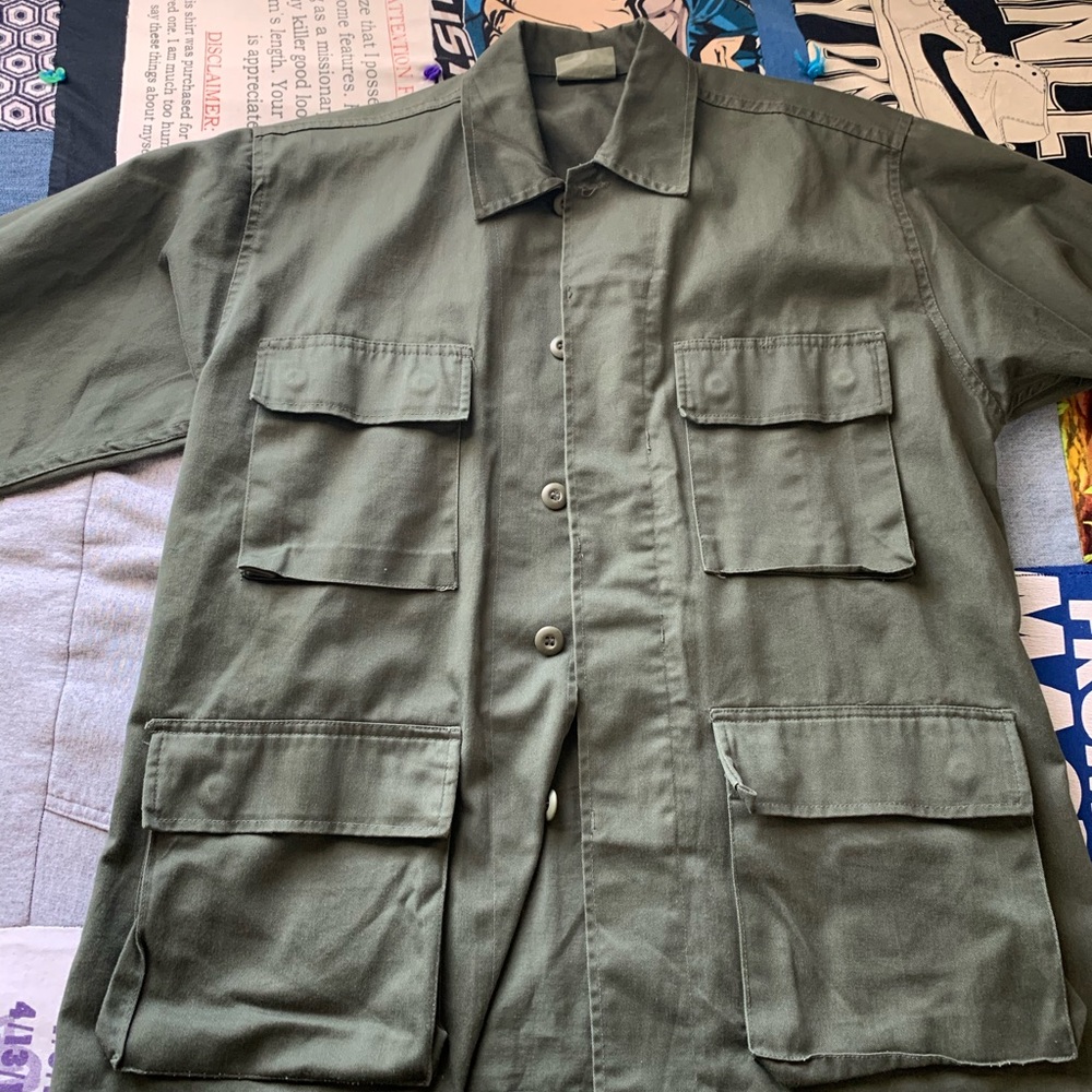 One military fatigues jacket and one JATS sweater